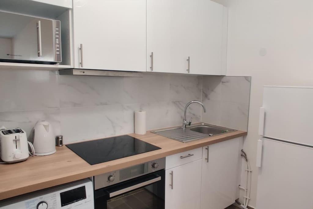 Appart Cosy Auber Porte De Paris Обервилье Экстерьер фото